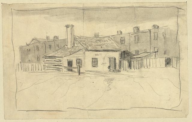 [Cabin behind rowhouses]