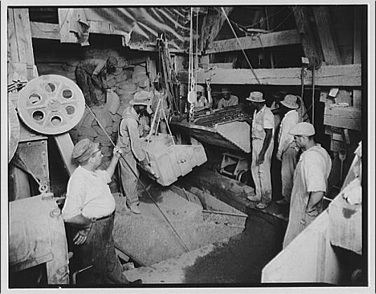 Cement mixer. Unloading cement from mixer I