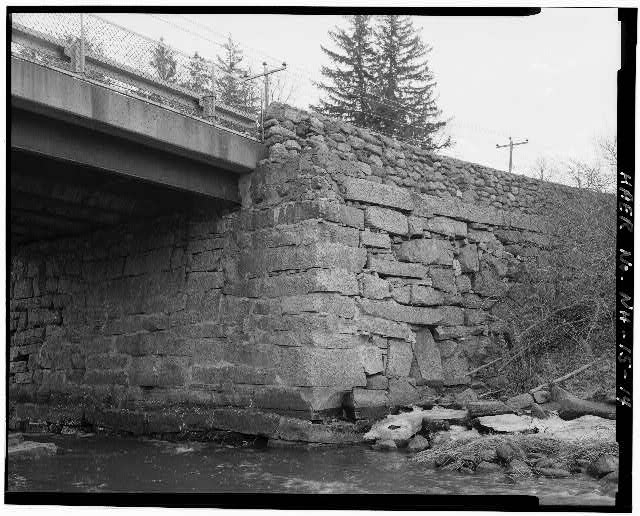 14. VIEW OF NORTH FACE OF SOUTH ABUTMENT, LOOKING...