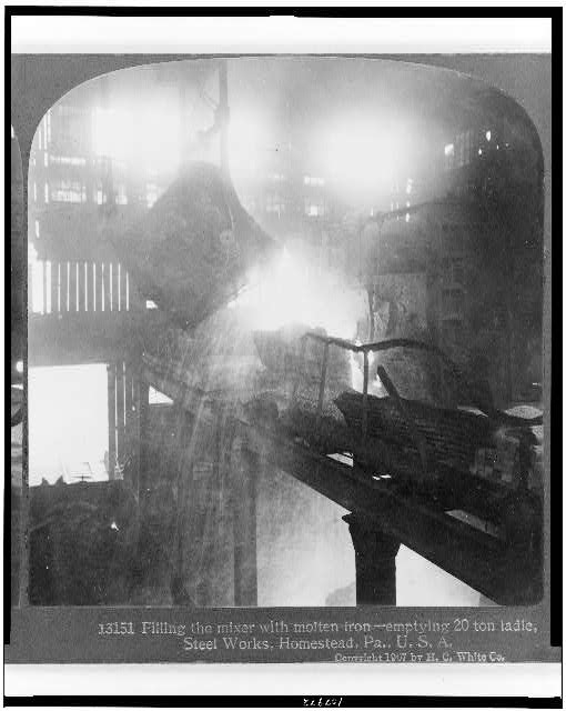 Filling the mixer with molten iron - emptying 20 ton...