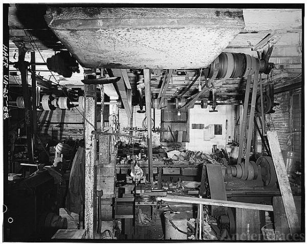 58. Machine shop: Interior view showing a lathe and 2...