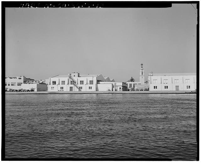 View of ramp area. Building 2 at left center, building 1...
