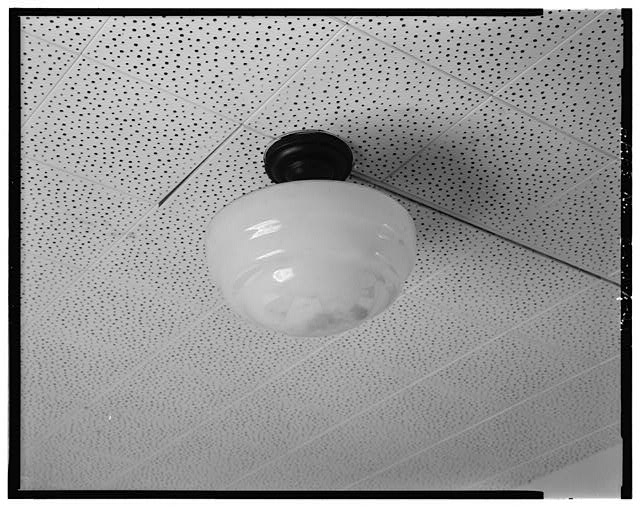 Interior detail of third floor light fixture, facing...