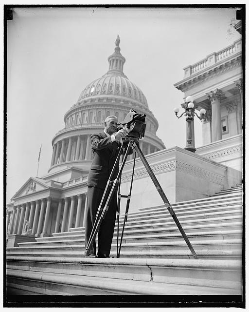Sen. McAdoo with movie cameras at Capitol, 4/13/38....