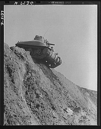 Testing M-4 tanks. Over the top, and ready to go down the...
