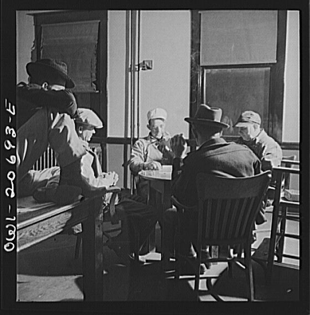 Vaughn, New Mexico. Railroad men playing dominoes in the...