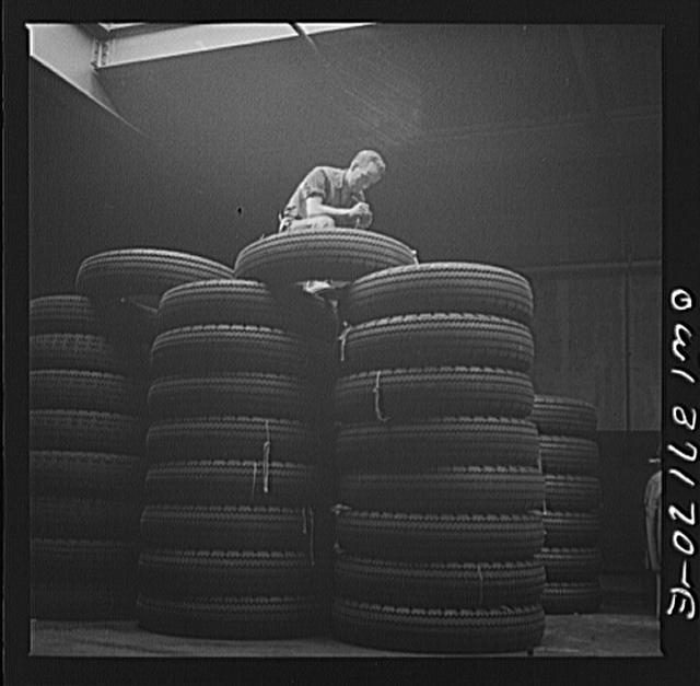 Pittsburgh, Pennsylvania. Checking brand numbers on new...