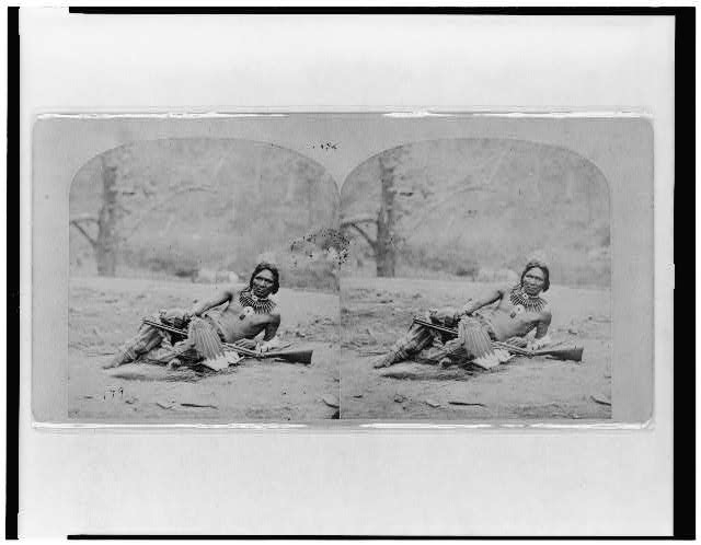 [Standing Buffalo, Winnebago man, reclining on ground,...