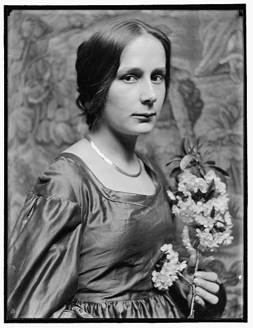 [Cornelia Montgomery, 3/4 face, holding flowers,...