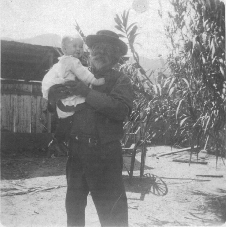 Baby Mattie and unknown man