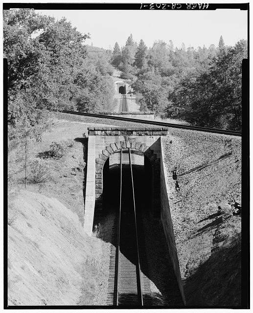 1. West portal of Tunnel 27 in distance, contextual view...