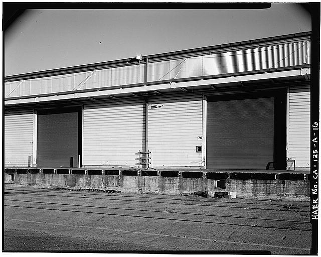 16. DETAIL VIEW OF NORTHWEST SIDE LOADING DOCKS, SHOWING...