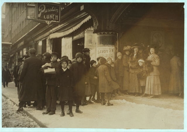 Long line of boys and men at Vaudeville Show. Saturday...