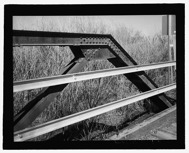 Detail view of riveted steel gusset plate connection -...