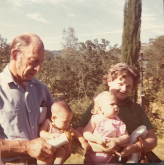 Merridy Rae and John with grandchildren
