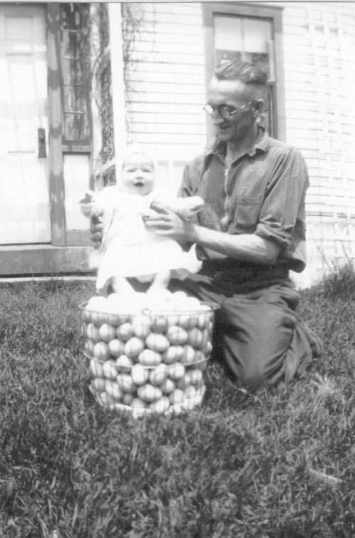 Uncle Cecil Murchie and Karen Hannigan on basket of eggs [Maine/NH]