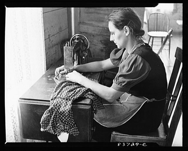 Fort Kent, Maine (vicinity). Mrs. Daigle makes clothes...