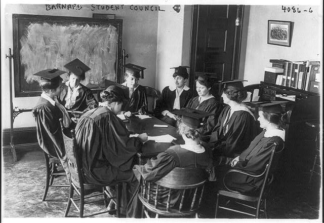 Barnard College student council - seated around table in...