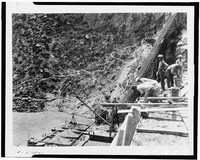 16. VIEW SHOWING AGGREGATE BEING UNLOADED. TRACK TO...