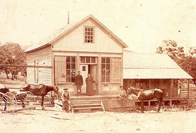 JC and Ida Ray Herod in front of their store