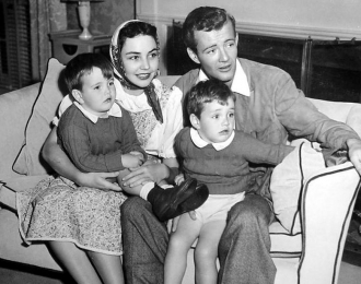 Jennifer Jones and Robert Walker Sr. with Robert Jr. and Michael.