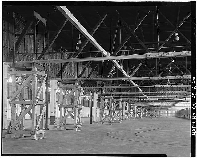 26. INTERIOR VIEW SHOWING ROW OF TIMBER SUPPORT TOWERS...