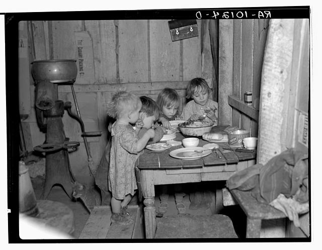 Christmas dinner in home of Earl Pauley. Near Smithfield,...
