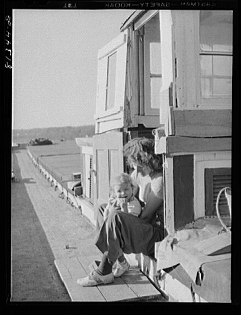 Many of the bargemen have their families with them. Erie...