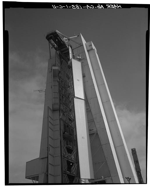 11. PARTIAL VIEW OF NORTH FACE OF MST AND BRIDGE CRANE...