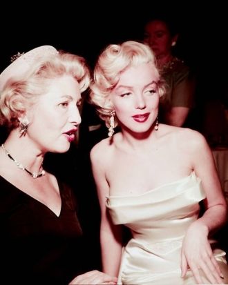 Sheilah Graham and Marilyn Monroe