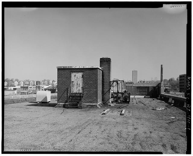 1. View across the roof of the M.T. Marcello Company...