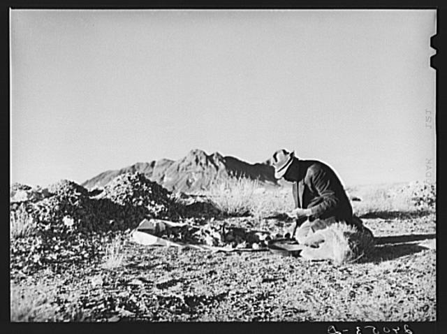 Prospector testing ore samples. Esmeralda County, Nevada