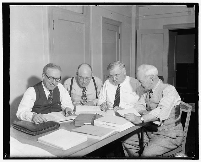 Group of 4 at R.R. hearing, 10/38