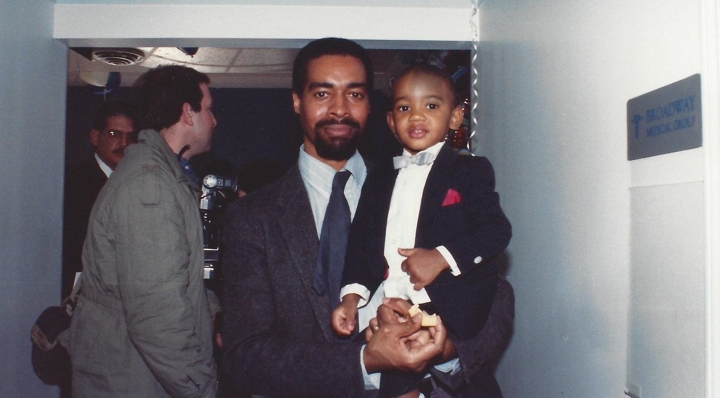 Ramon Marquez M.D. Friend at Grand Opening with son.