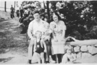 Man, woman and two boys.