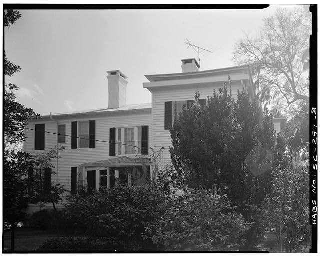 8. NORTH SIDE. Northwest wing at right not original -...