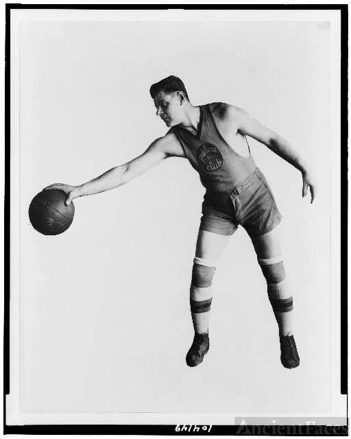 [Basketball player of the Palace Club holding basketball...