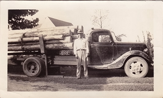Pat Haynes with logging truck